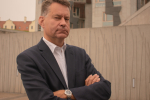 Murdo pictured beside the Scottish Parliament